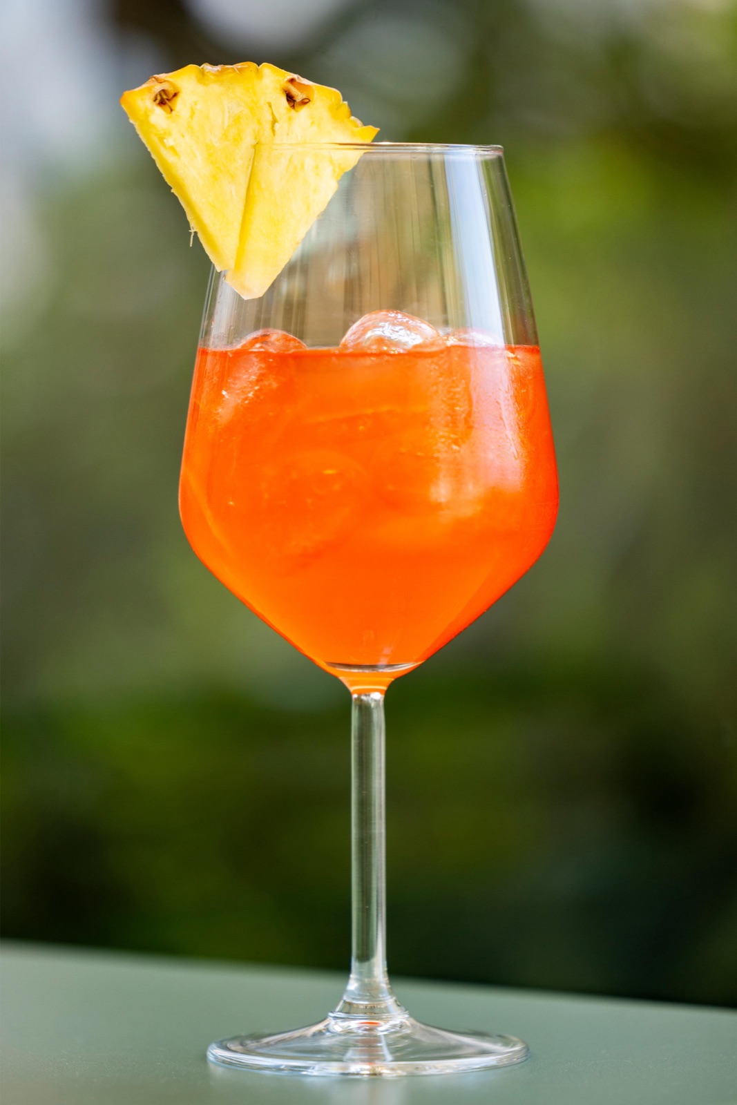 A spritz garnished with pineapple